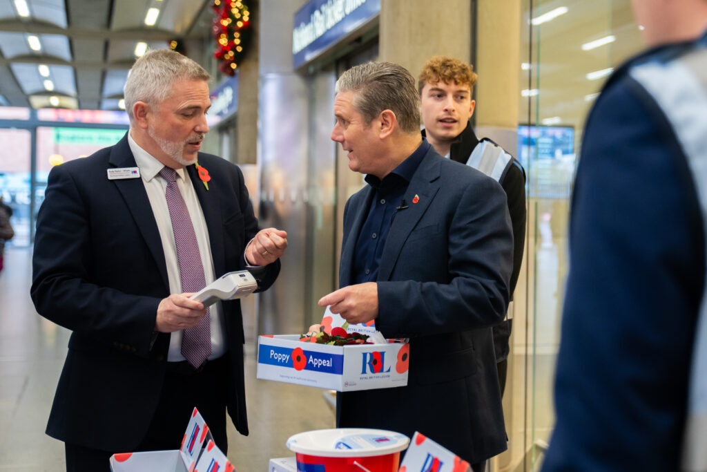 Keir Starmer at the Royal British Legion stand at St Pancras International station with Andy Taylor-Whyte, Interim Director of the Poppy Appeal