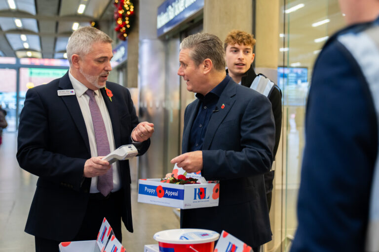 Keir Starmer at the Royal British Legion stand at St Pancras International station with Andy Taylor-Whyte, Interim Director of the Poppy Appeal