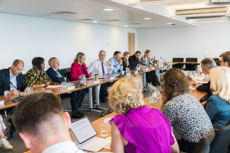 Keir Starmer at full boardroom meeting